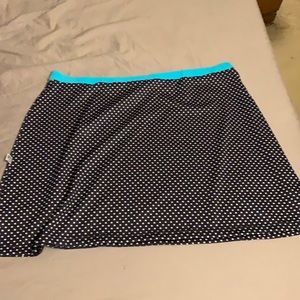 Good condition Lej size XL swimsuit cover up skirt. Black and white teal waist